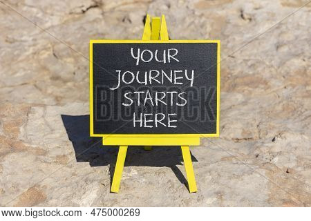 Your Journey Starts Here Symbol. Concept Words Your Journey Starts Here On Black Chalk Blackboard On
