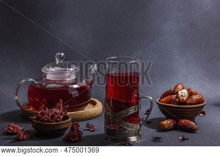 Hibiscus Hot Tea With Dates. Traditional Ramadan Kareem Concept Snack For Iftar Or Suhoor Meal