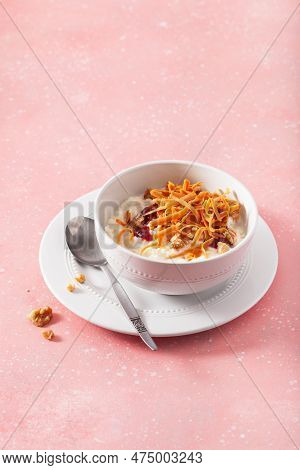 Rice Pudding With Norwegian Brunost Traditional Brown Cheese And Raspberry Jam