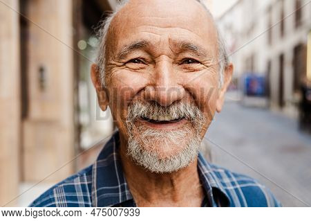 Portrait Of Happy Senior Man Smiling In Front Of Camera - Elderly People Lifestyle Concept