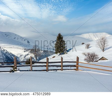 Winter  Morning Scenery Picturesque Mountain Hill Top With Farmstead Snow Covered (ukraine, Carpathi