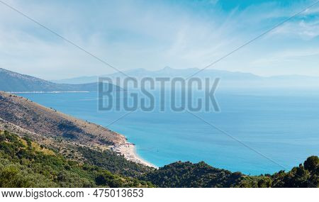 Adriatic Sea Summer Coast With Beach And Corfu Island In Mist (lukove Komuna, Albania). View From Mo