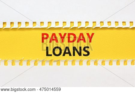 Payday Loans Symbol. Concept Words Payday Loans On Beautiful Yellow Paper. Beautiful White Table Whi