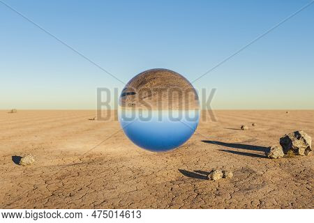 Glas Sphere Ball Hovering In The Air In Large Empty Desert Environment; Abstract Surreal Concept; 3d