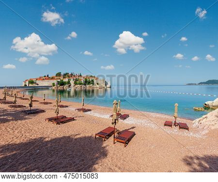 Pink Sandy Milocher Beach And Sveti Stefan Islet Morning View (montenegro, Near Budva). People Unrec