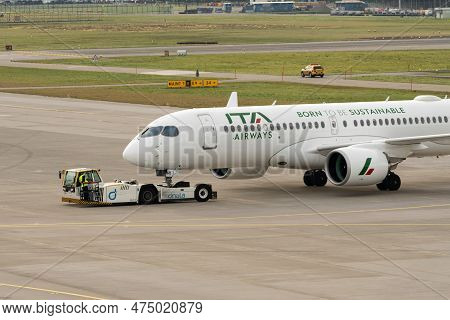 Zurich, Switzerland, January 2, 2023 Ita Airways Bombardier Cs-300 Or Airbus A220 Aircraft Is Pushed
