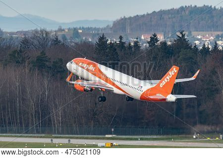 Zurich, Switzerland, January 2, 2023 Easy Jet Airbus A320-214 Aircraft Leaving From Runway 28