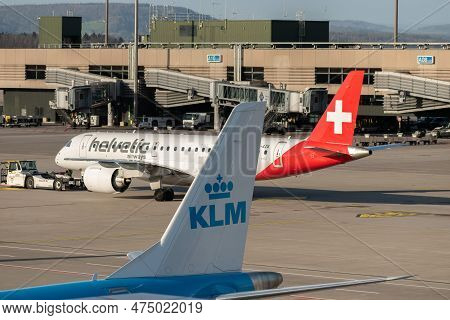 Zurich, Switzerland, January 2, 2023 Helvetic Airways Embraer E190-e2 Aircraft Is Towed Behind The R