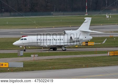 Zurich, Switzerland, January 2, 2023 Dessault Falcon 7x Business Aircraft Is Taxiing To Its Position