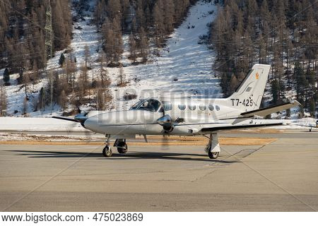 Samedan, Switzerland, February 21, 2023 Cessna 425 Conquest Multi Engine Propeller Aircraft Is Taxii