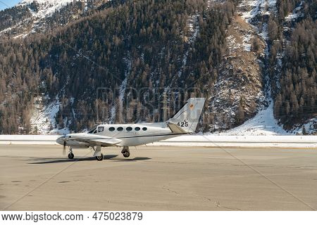Samedan, Switzerland, February 21, 2023 Cessna 425 Conquest Multi Engine Propeller Aircraft Is Taxii
