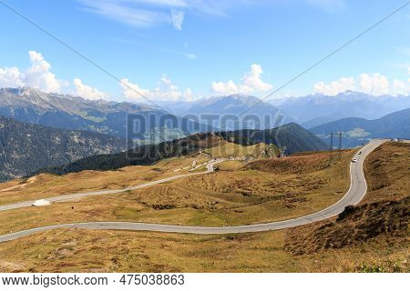 Panorama View Of Road With Serpentines At Mountain Pass Jaufen Pass In South Tyrol, Italy