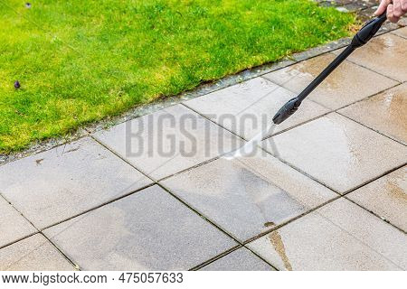 Detail Of Cleaning Terrace With High-pressure Water Blaster, Cleaning Dirty Paving Stones
