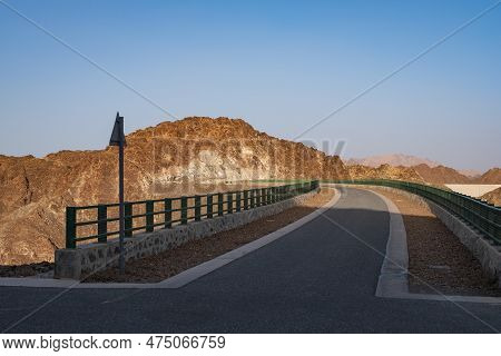 Hatta Dam And Reservoir In Hatta, An Enclave Of The Emirate Of Dubai In The Hajar Mountains, United 