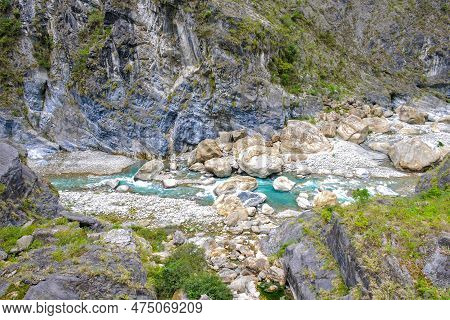 Scenic View Of Swallow Grotto Yanzikou Trail With Narrow Turquoise Liwu River Gorge And High Mountai