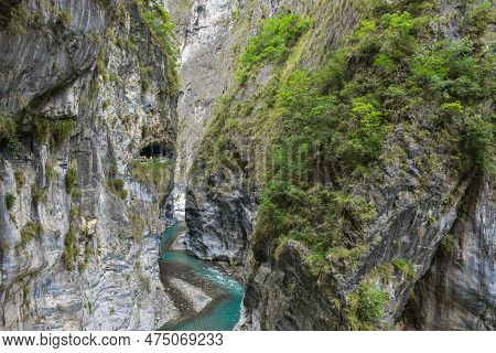 Scenic View Of Swallow Grotto Yanzikou Trail With Narrow Turquoise Liwu River Gorge And High Mountai