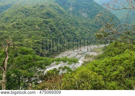 Green Mountain Gorge With Small Creek Flows Through The Middle In Forest At Taroko National Park In 