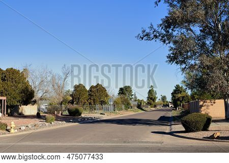 Xeriscaped Road Sides With Drought Tolerant Shrubs In Residential Neighborhood In North-west Phoenix