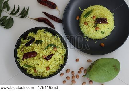 Raw Mango Rice. South Indian Dish Also Called As Mamidikaya Pulihora, Mavinakayi Chitranna, Mango Ri