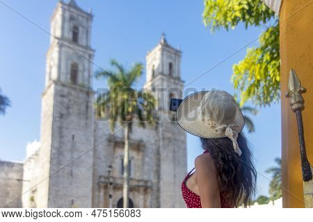 Tourist Woman With Hat In Front Of The Background Of San Servacio Cathedral In The Mexican City Of V