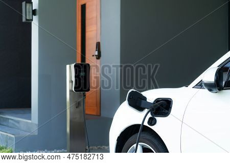 Progressive Concept Of Ev Car And Home Charging Station Powered By Sustainable And Clean Energy With