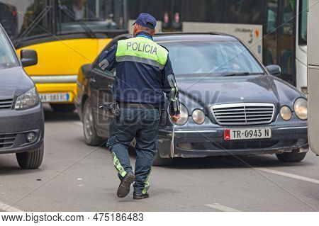 Tirana, Albania - April 23 2019: Road Policeman (policia Rrugore) Doing The Traffic.
