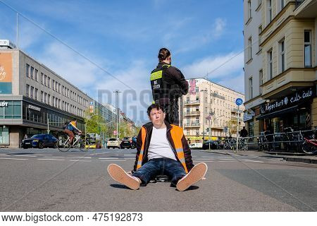 Berlin, Germany - April 24, 2023: Protesters From The Group Last Generation Sitting On The Street An