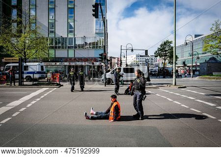 Berlin, Germany - April 24, 2023: Protesters From The Group Last Generation Sitting On The Street An
