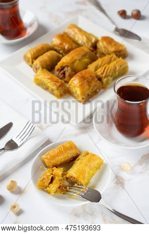 Baklava. Traditional Turkish Desserts Baklava With Turkish Tea. Crispy Walnut Baklava