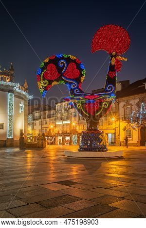 Barcelos, Portugal - Circa Jauary 2019: View At The Pop Galo At Night, Public Art Inspired In The Ba