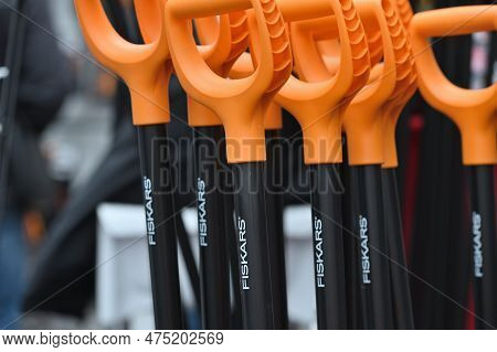 Kaunas, Lithuania - March 30, 2023:b Lack And Orange Fiskars Solid Shovels Close-up At International
