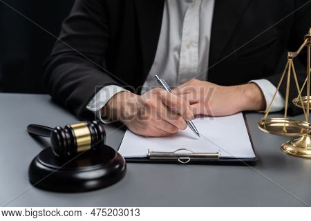 Focus Symbols Of Justice, Gavel Hammer And Scale Balance On Blurred Background Of Lawyer Or Judge Si