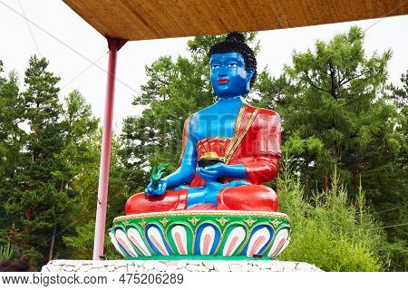 Medicine Buddha Statue In Arshan Village. The Republic Of Buryatia. Close-up