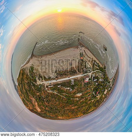 Tiny Planet Of Coast In Sunset Above Sea By Village Karpen In Albania, Europe