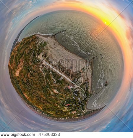 Tiny Planet Of Coast In Sunset Above Sea By Village Karpen In Albania, Europe
