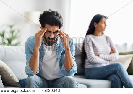Frustrated Indian Man Touching His Head, Fighting With Wife