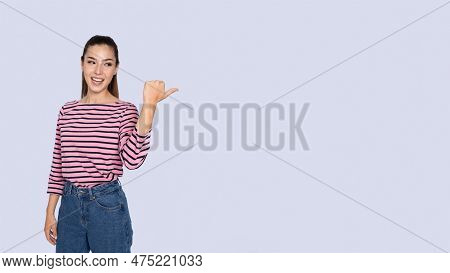 Emotional Attractive Young Hispanic Woman Pointing At Copy Space