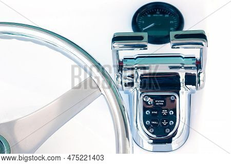 Motor Yacht Control Panel. Steering Wheel, Gear Levers, Control Button Tachometer. Luxury Yacht Navi