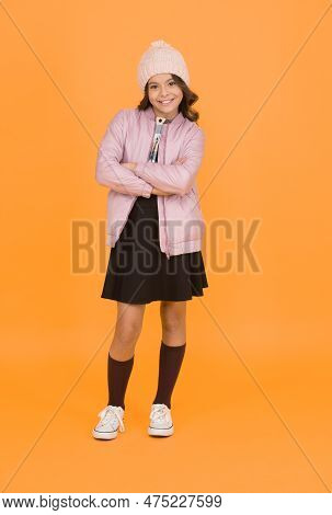 Cheerful Child Yellow Background. Beauty And Fashion For Kid. Back To School. Ready For Winter Vacat