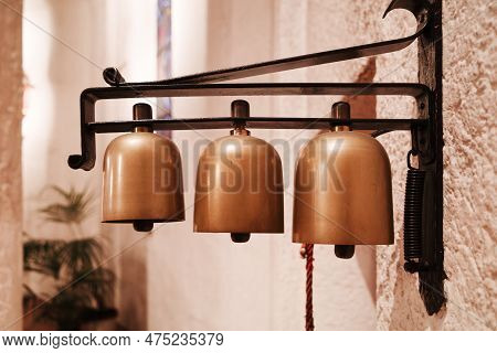 Three Little Bells In The Church To Serve At The Liturgical Ceremonies.