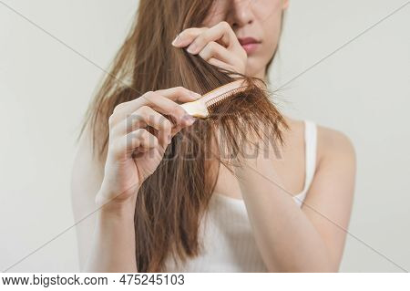 Damaged Hair, Frustrated Asian Young Woman, Girl Hand In Holding Brush Splitting Ends Messy While Co