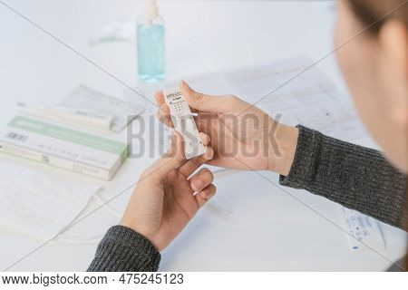 Pandemic Of Disease, Asian Young Woman, Girl Hand Show Holding Atk, Antigen Kit Self Test. Introduci
