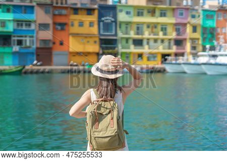 Woman Traveler Visiting In Taiwan, Tourist With Backpack And Hat Sightseeing In Keelung, Colorful Zh