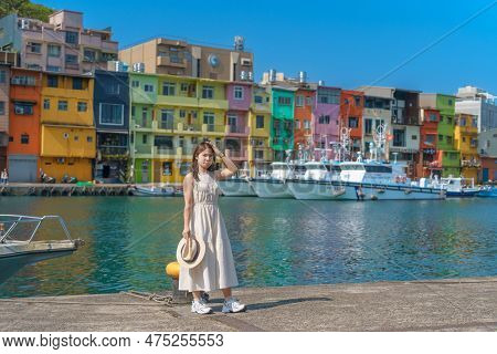 Woman Traveler Visiting In Taiwan, Tourist With Hat Sightseeing In Keelung, Colorful Zhengbin Fishin
