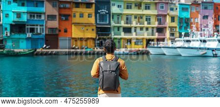 Man Traveler Visiting In Taiwan, Tourist With Backpack Sightseeing In Keelung, Colorful Zhengbin Fis