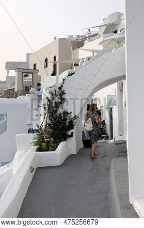 Imerovigli, Santorini, Greece - July 1, 2021:  Whitewashed Houses In Imerovigli On Santorini Island,