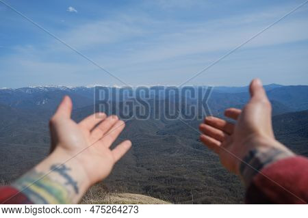 Arms Of Guy In Red Shirt And Tattoo Stretched Forward To Indicate Direction Or Embrace Nature And Wh