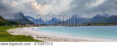 Summer Cloudy View Of The Beach With White Sand In Ramberg (norway, Lofoten). People Unrecognizable.