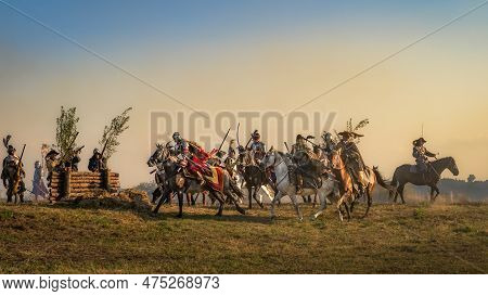Gniew, Poland, Aug 2020 Charge Of The Hussars, Polish Heavy Cavalry, At Sunset, On Enemy Fortificati