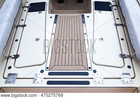 Deck Of A Luxury Modern Yacht With Closed Hatches And Steps.